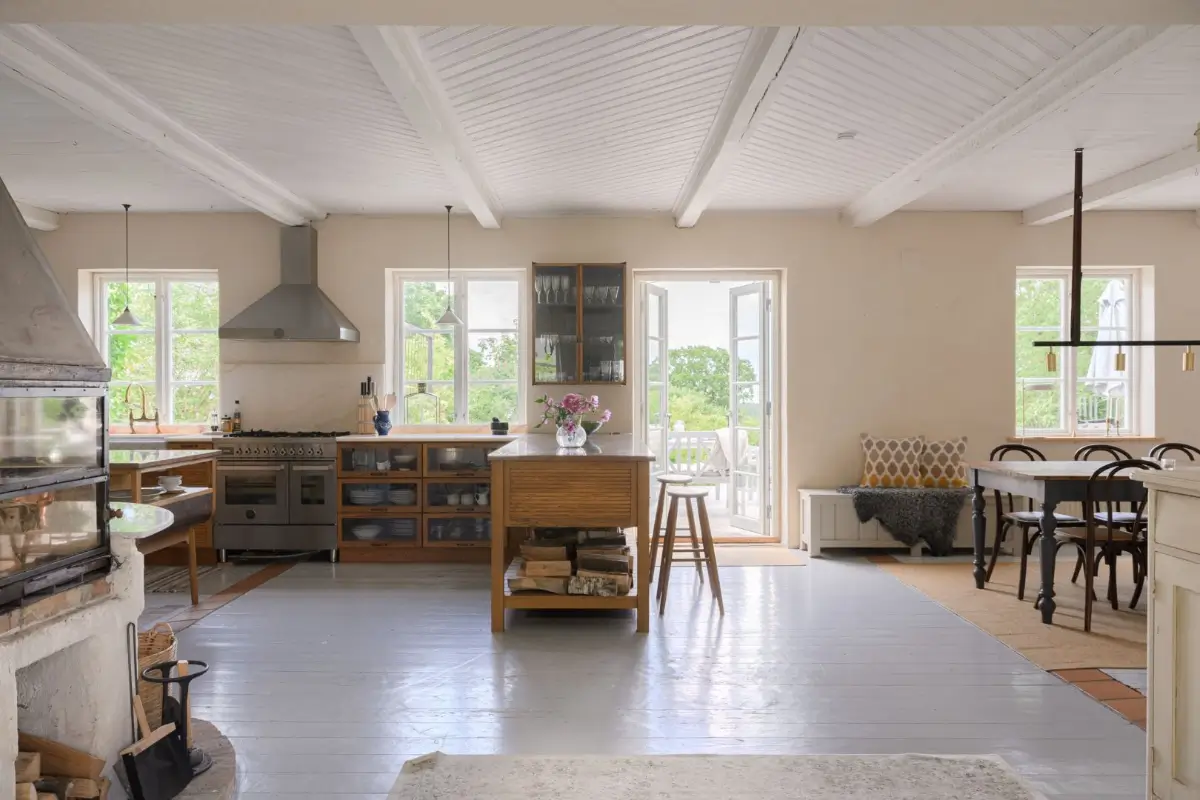 Historic Character and a deVOL Kitchen in a Swedish Country House 6 open plan living space wooden ceiling devol kitchen