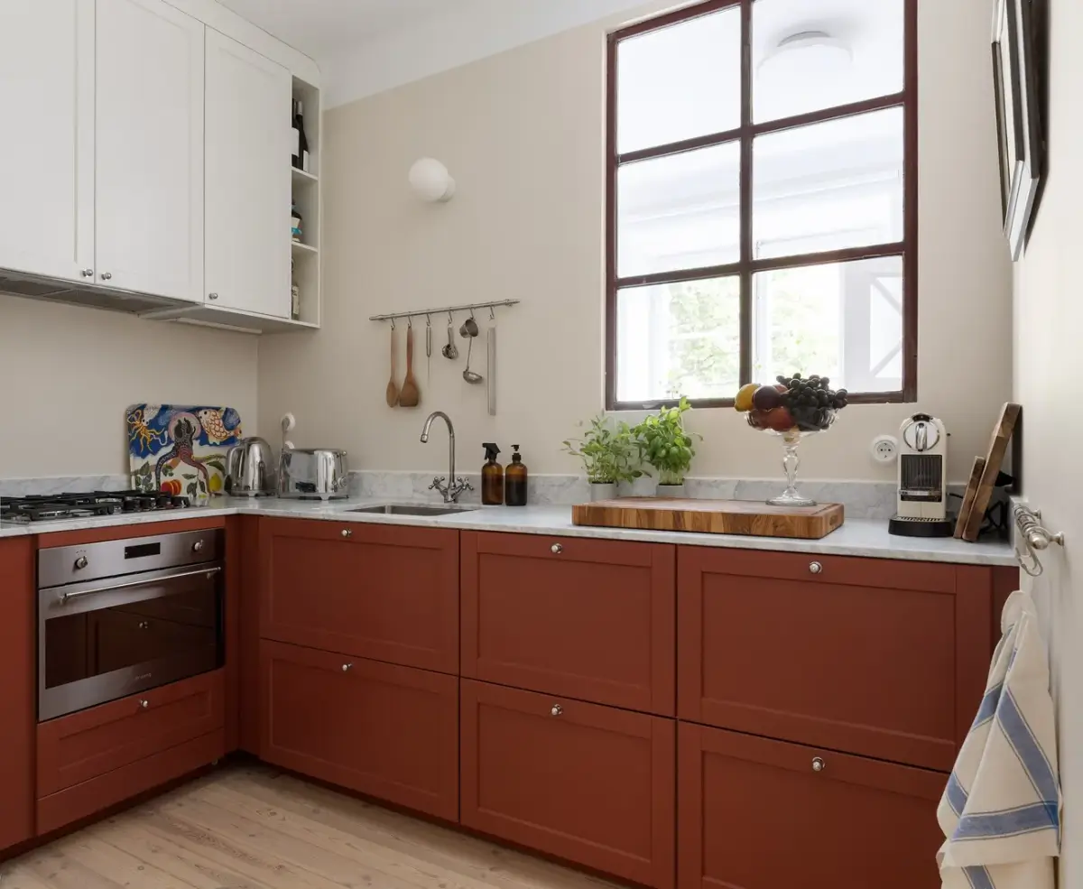 A Red Kitchen in a Small and Light Scandinavian Apartment 2 red kitchen marble countertop