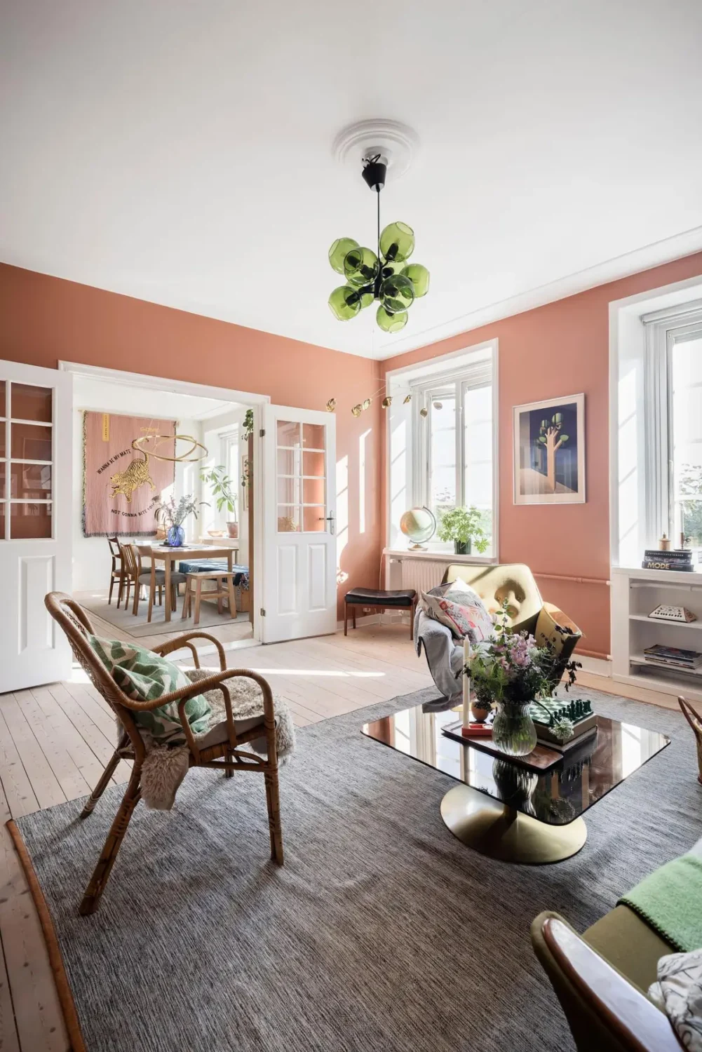 A Colorful 1920s Family Apartment in Sweden 7 scandi living room terracotta colored walls nordroom