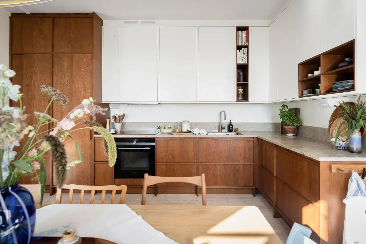 A Colorful 1920s Family Apartment in Sweden 13 scandinavian kitchen with open cabinets