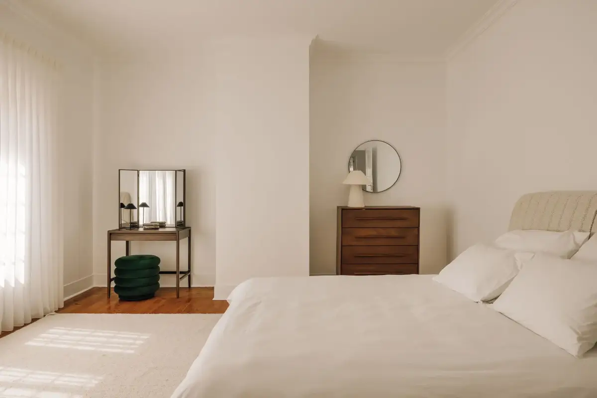 An Art Deco Villa with a Moroccan-Inspired Garden in Portugal 13 serene bedroom vanity table green pouf