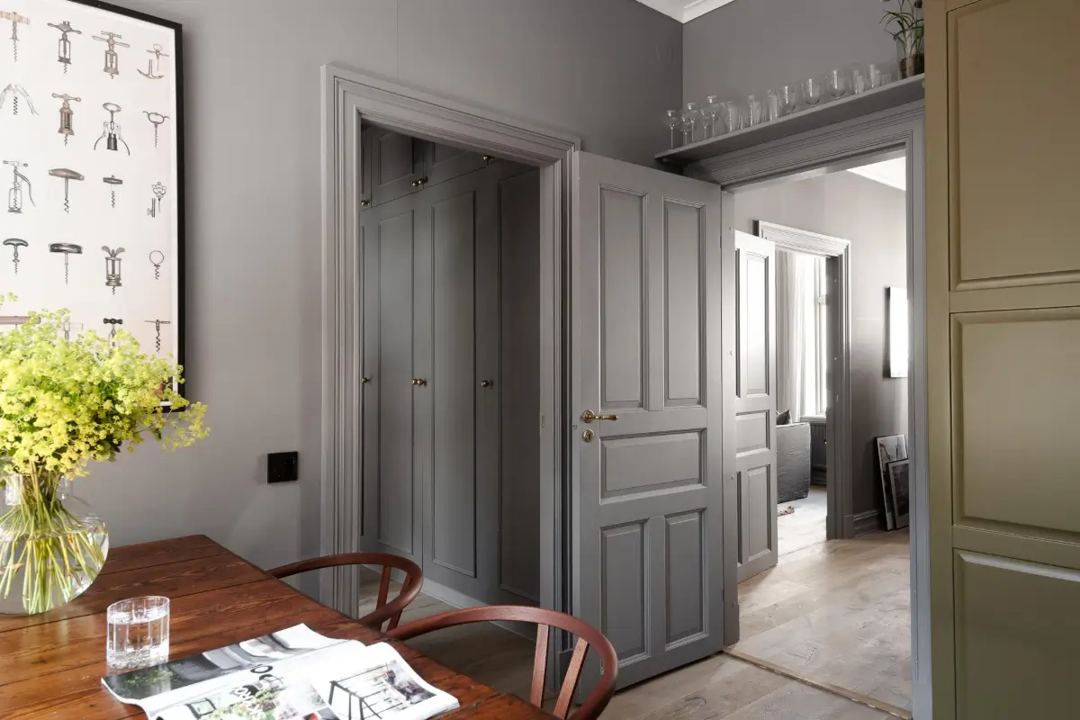 A Dark Gray Swedish Apartment with an Olive Green Kitchen 7 c