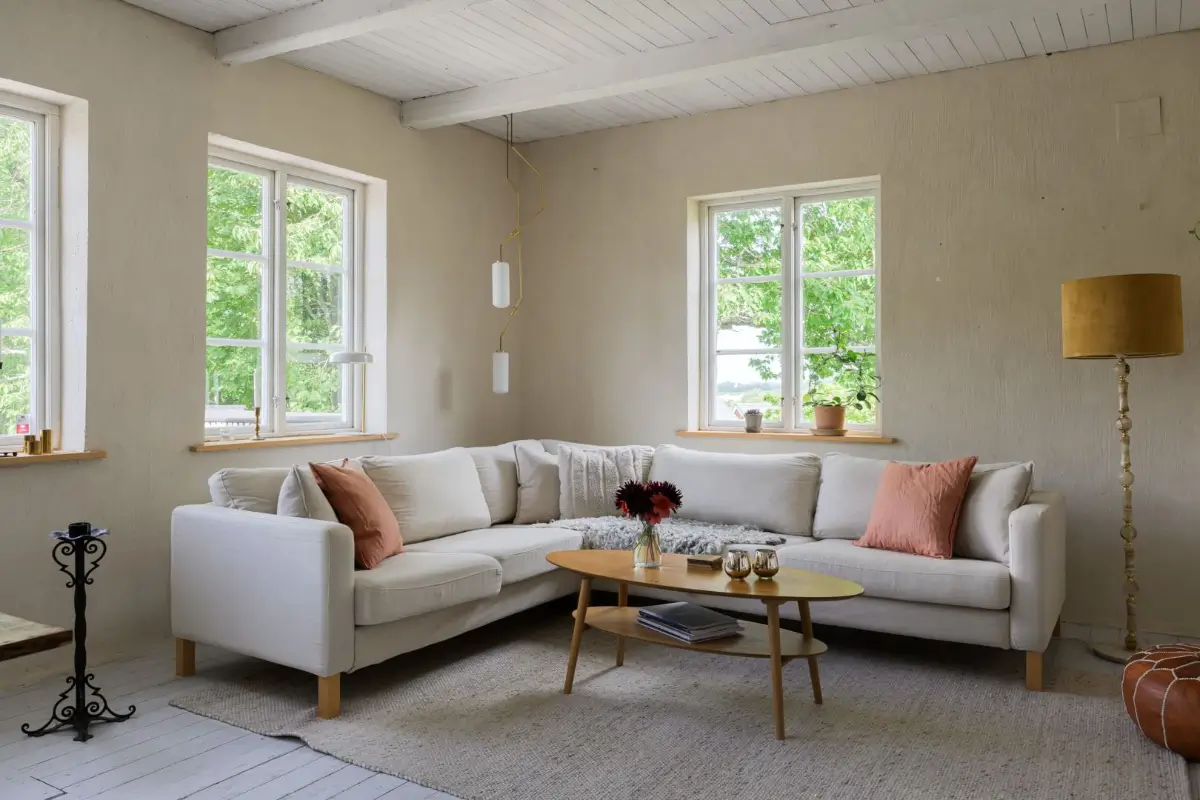 Historic Character and a deVOL Kitchen in a Swedish Country House 18 sitting room corner sofa