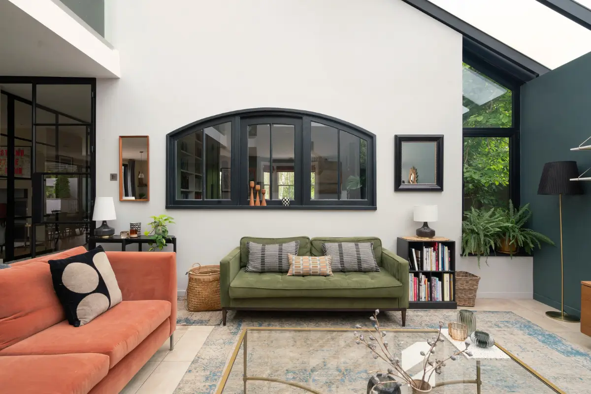 Contemporary Open-Plan Living Spaces in an English Victorian House 4 sitting room dark blue feature wall