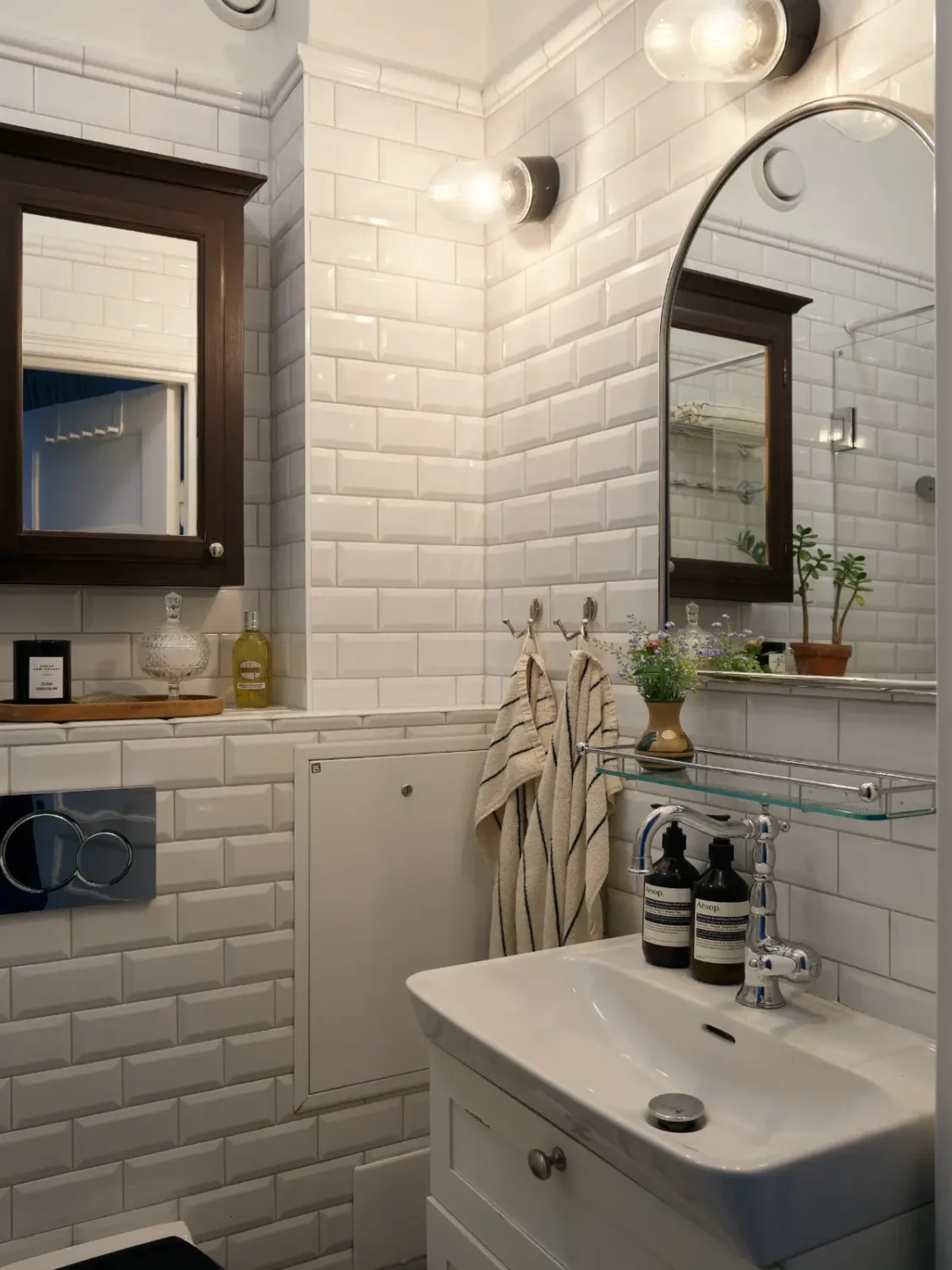 A Muted Color Palette in a Cozy 1920s Apartment in Stockholm 20 small classic white-tiled bathroom nordroom
