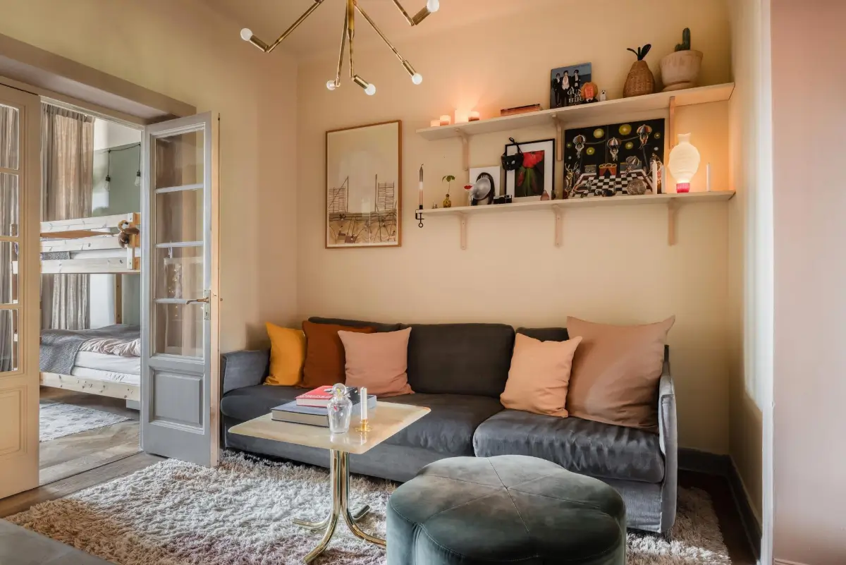 Colorful Rooms in a Practical Stockholm Family Apartment 9 small living room beige walls shelves