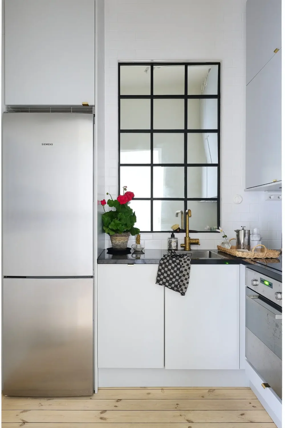 A Classic Stockholm Family Apartment with a Separate Studio 40 small white kitchen inner window