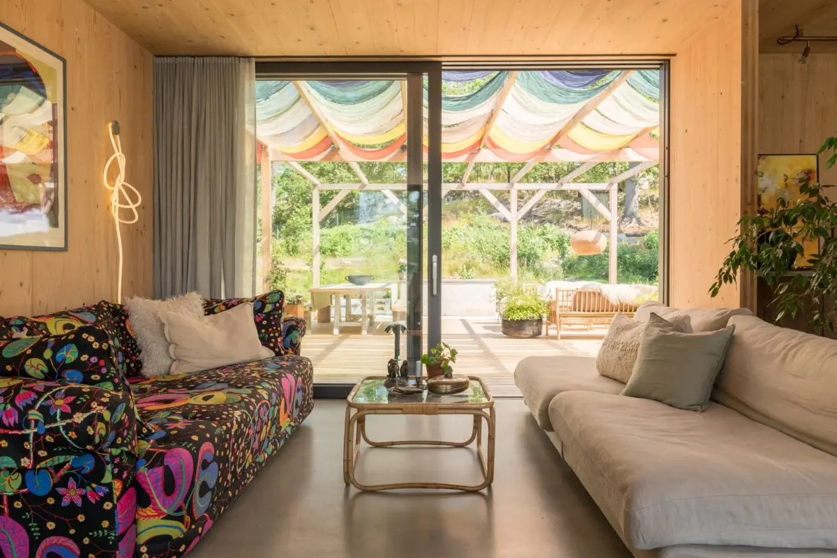 A Modern Wooden Cottage with Sea Views Close to Stockholm 10 sofa josef frank pattern