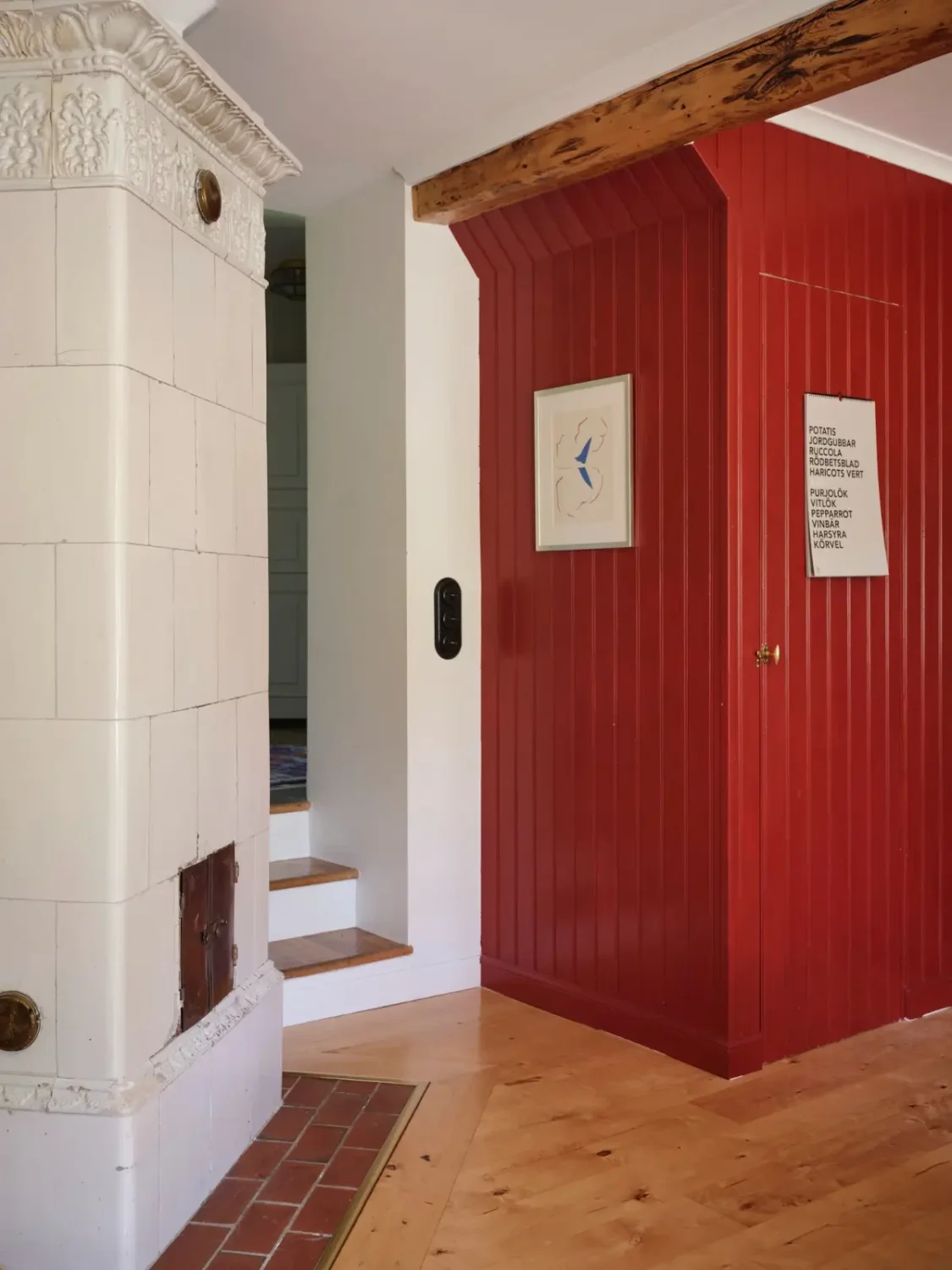 A Colorful Family Home in an Old Gardener's Cottage in Sweden 7 swedish fireplace