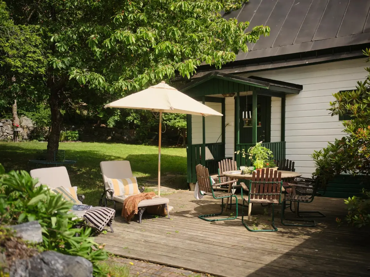 A Colorful Family Home in an Old Gardener's Cottage in Sweden 41 terrace lounge chairs
