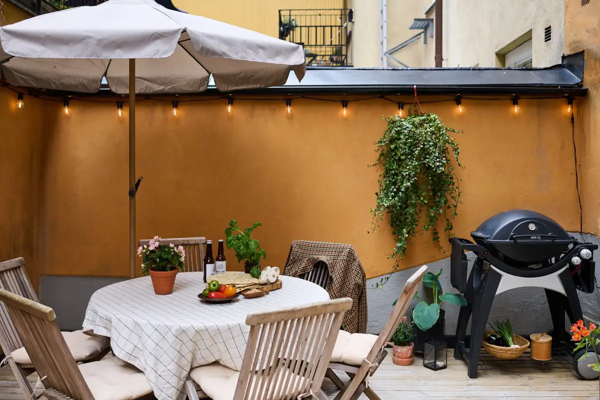 A Colorful Stockholm Apartment with a Large Terrace 24 terrace round dining table