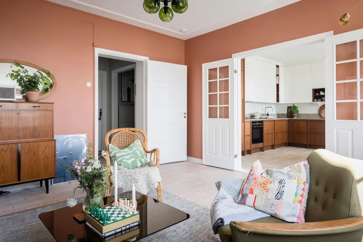 A Colorful 1920s Family Apartment in Sweden 6 terracotta living room wooden floor