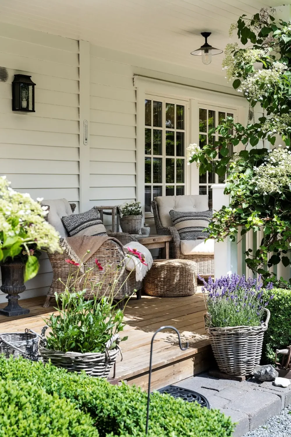 Scandinavian Design Meets The Hamptons in a Swedish Country House 3 veranda seating