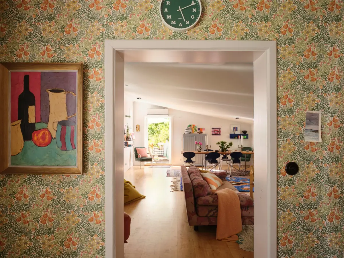 A Colorful Family Home in an Old Gardener's Cottage in Sweden 8 view into living room