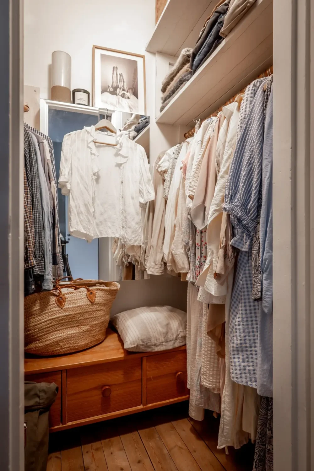 An Earthy Color Palette and Exposed Brick in a 1940s Apartment 22 walk-in wardrobe