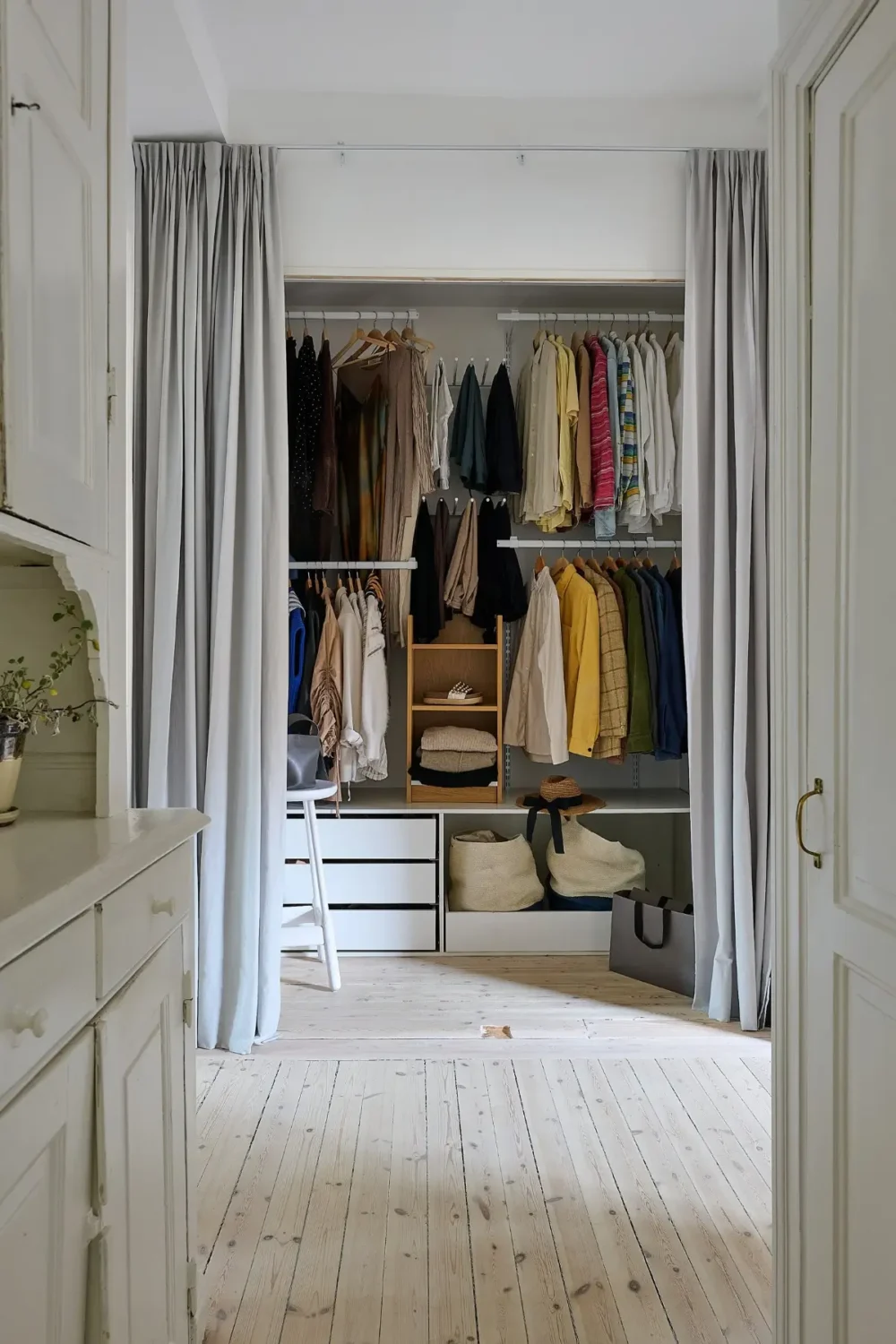 A Classic Stockholm Family Apartment with a Separate Studio 22 wardrobes behind curtains