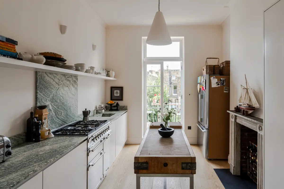 A Bright Late Victorian Townhouse in London 7 white kitchen wooden island