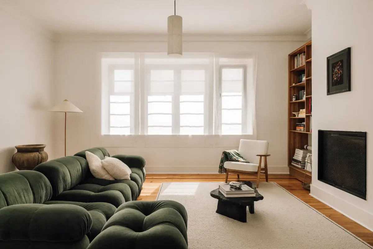 An Art Deco Villa with a Moroccan-Inspired Garden in Portugal 2 white living room with green sofa