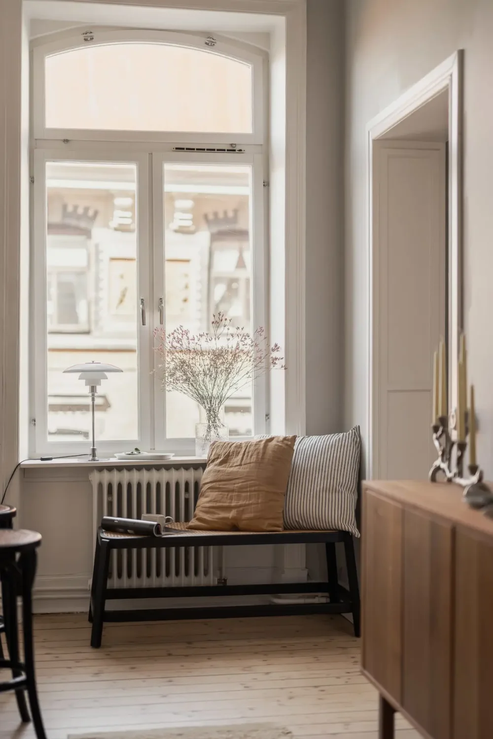 A Gray Scandinavian Apartment with a Royal History 16 window seat