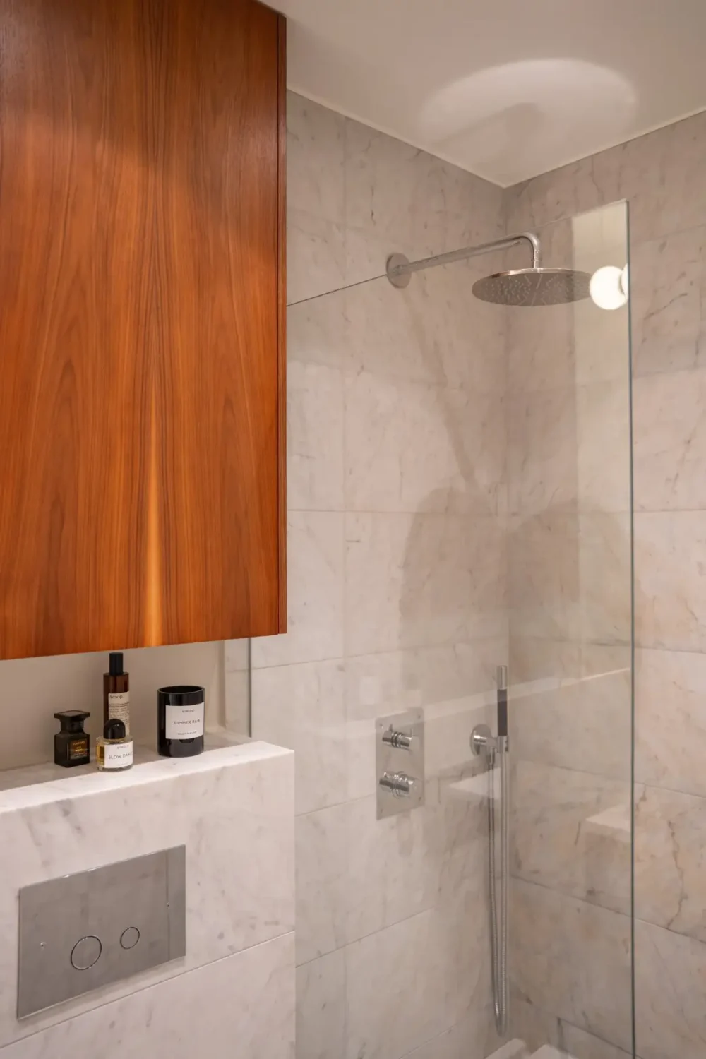 Arched Windows and Design Classics in a 19th Century Apartment 22 wooden bathroom cabinet