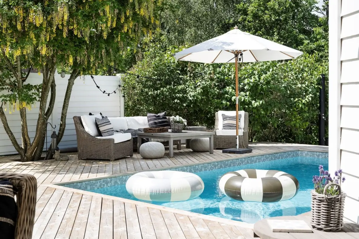 Scandinavian Design Meets The Hamptons in a Swedish Country House 52 wooden deck seating