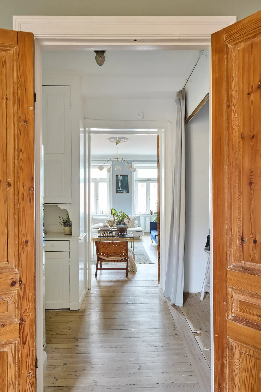 A Classic Stockholm Family Apartment with a Separate Studio 21 wooden doors view into apartment
