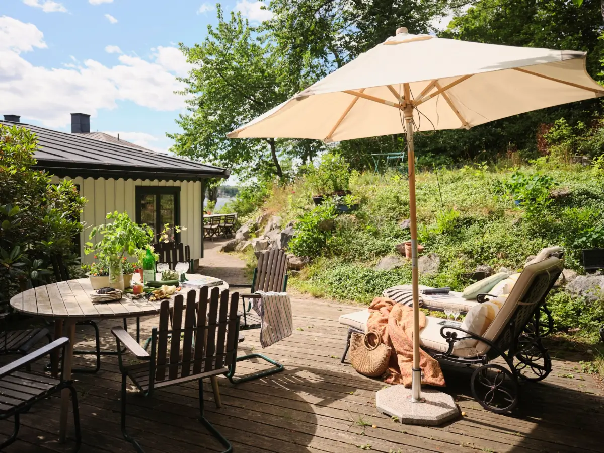 A Colorful Family Home in an Old Gardener's Cottage in Sweden 42 wooden terrace