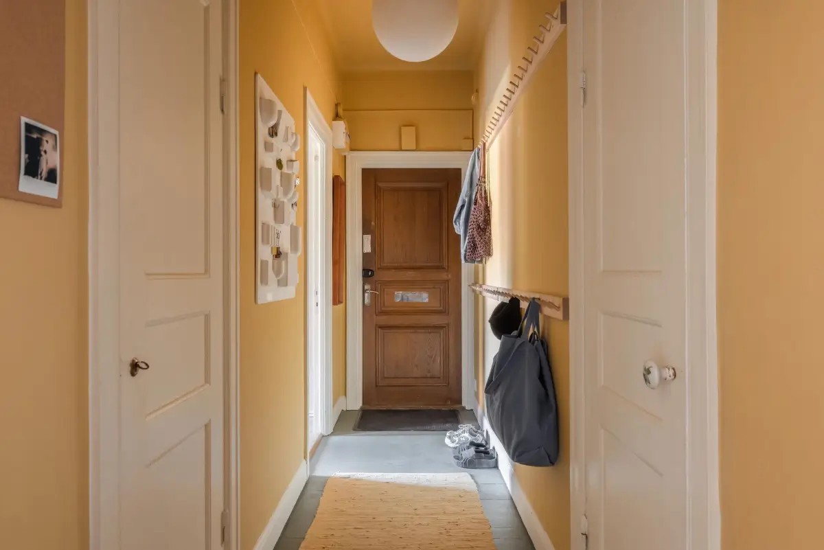 Colorful Rooms in a Practical Stockholm Family Apartment 23 yellow hall Colorful Rooms in a Practical Stockholm Family Apartment