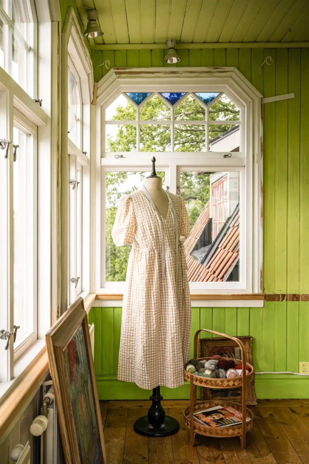 A Cozy Early 20th-Century Home with Views of Lake Mälaren in Sweden 31 atelier green paneling