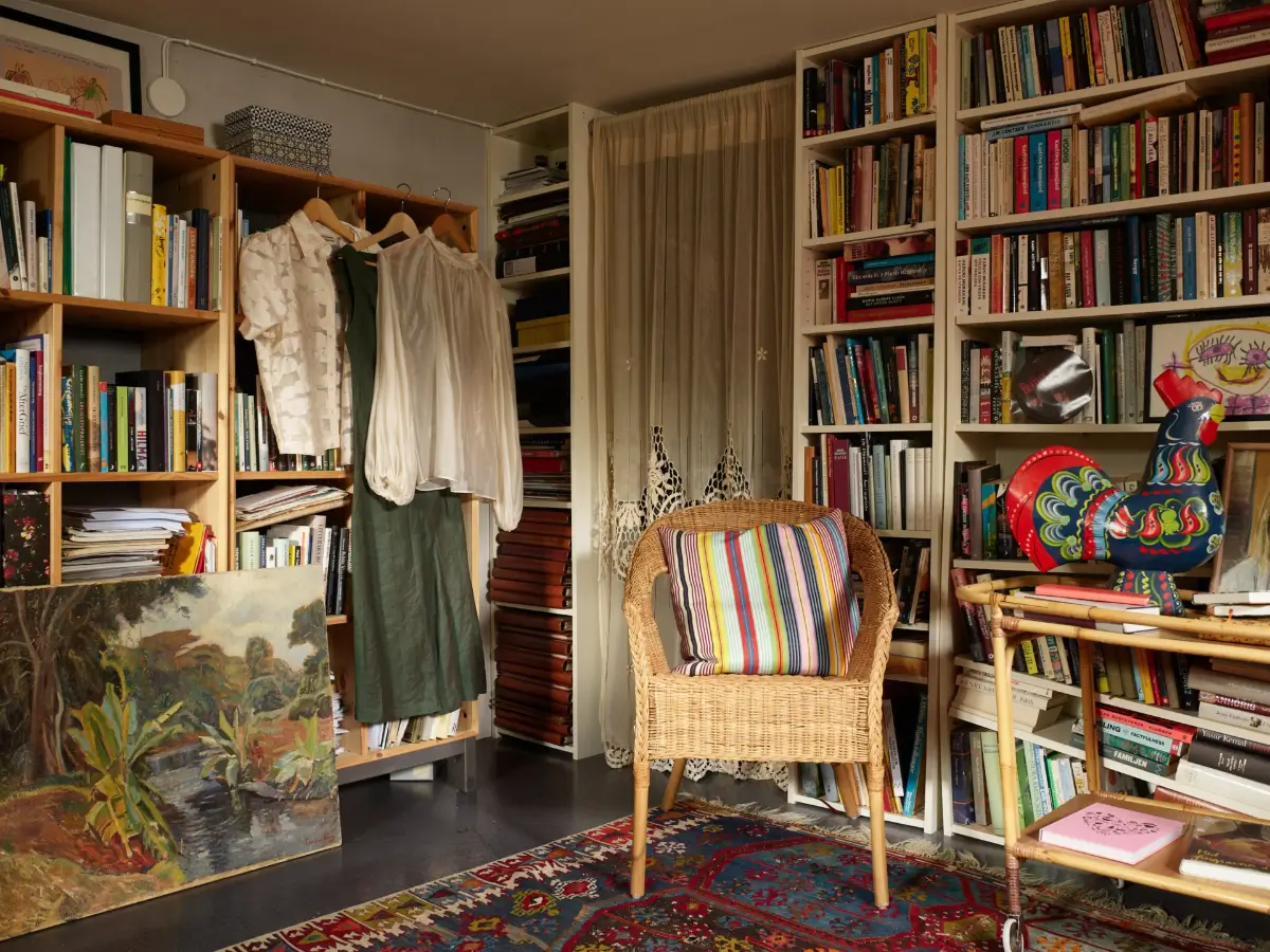 A Well-Preserved 1920s House with a Green Kitchen in Stockholm 33 basement room home library