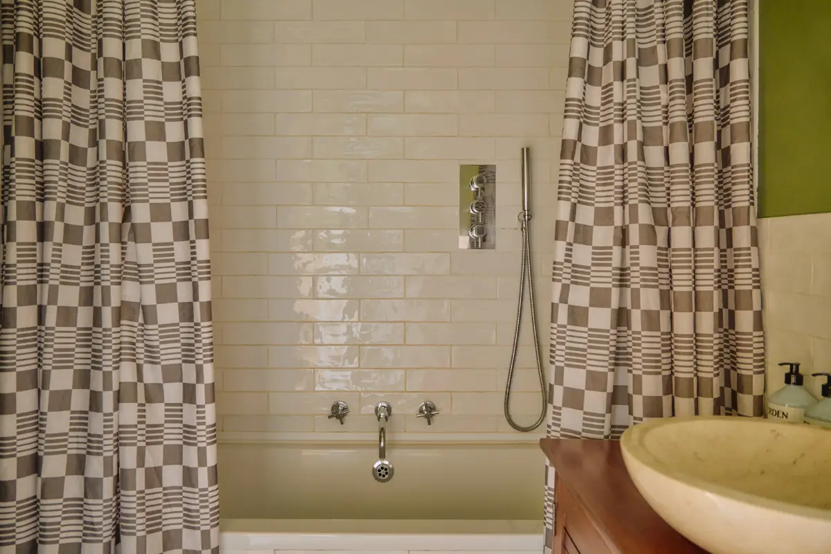 Modern Craftsmanship and Historic Charm in a London Home 26 bathroom white tiles