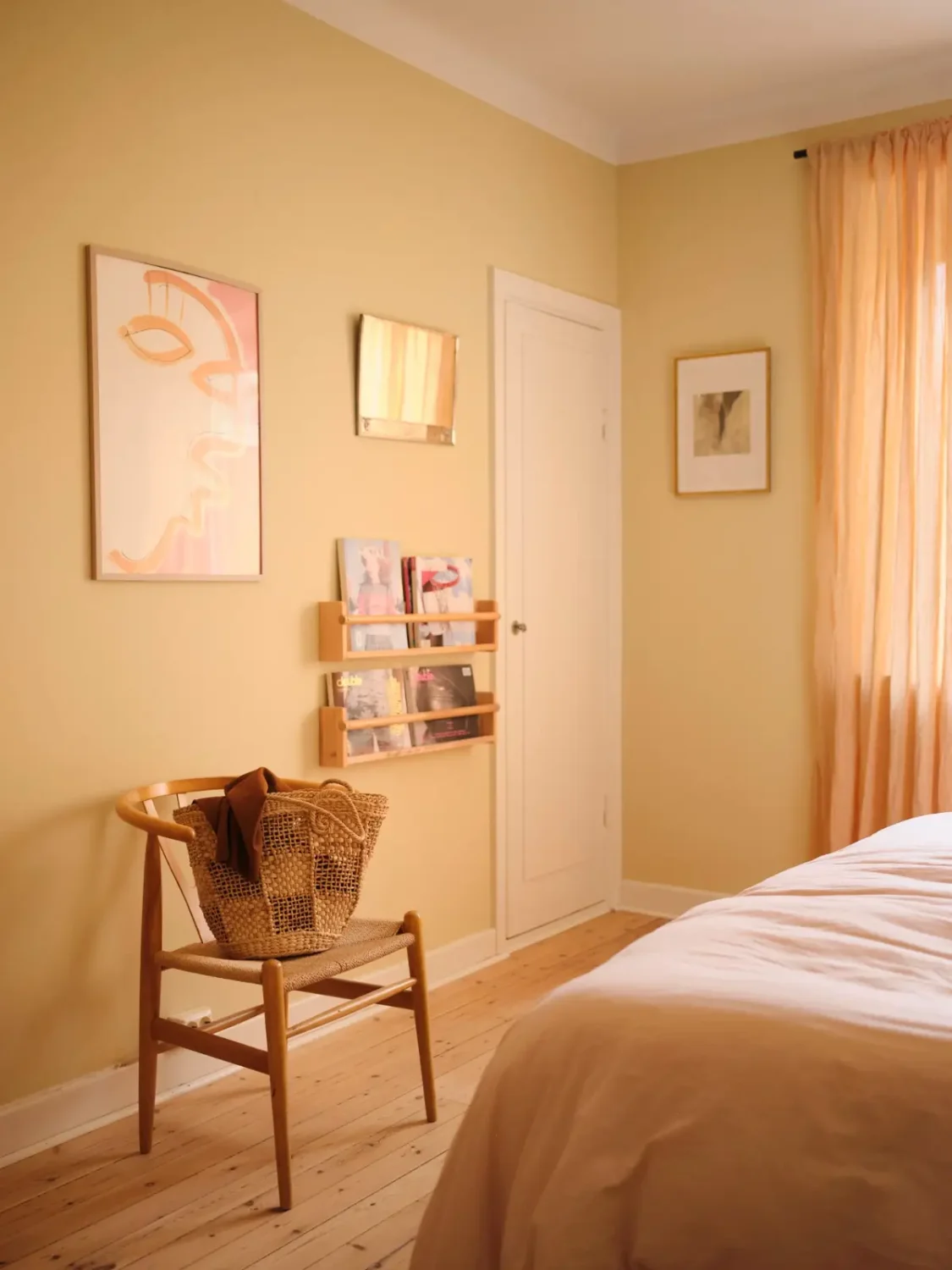 Soft Beige Interiors with the Occasional Bright Color Pop in Stockholm 21 bedroom beige-yellow walls