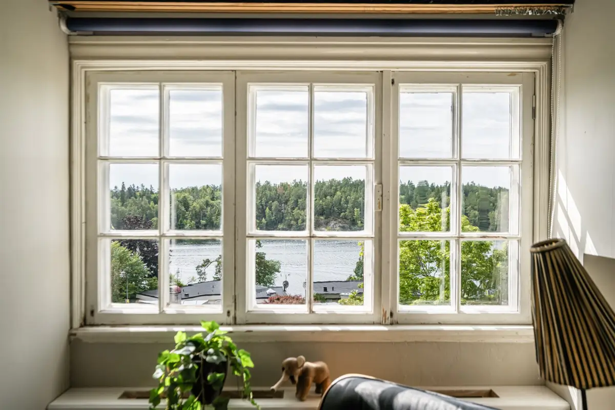 A Cozy Early 20th-Century Home with Views of Lake Mälaren in Sweden 21 bedroom window view