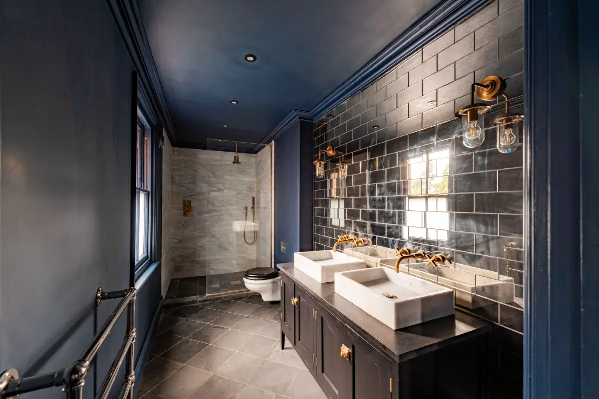 A Dramatic Color Palette in a Large Victorian Family Townhouse 22 blue bathroom mirror tiles