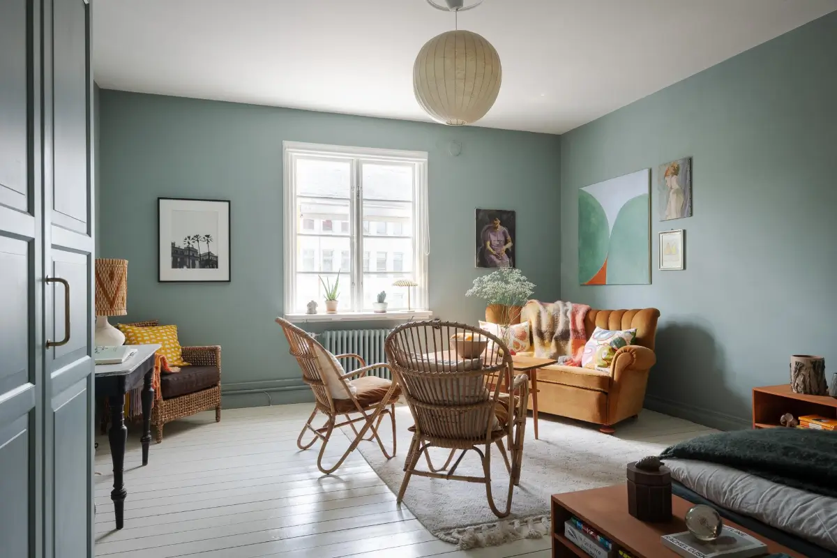 Historic Character and Color in a Swedish Studio Apartment 1 blue-gray studio apartment vintage sofa