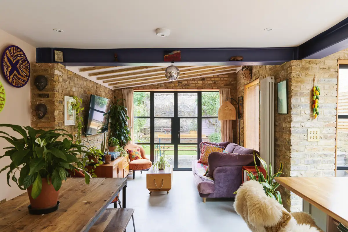 An Extended Victorian Apartment with Exposed Brick Walls 2 brick walls extended living space concrete floor