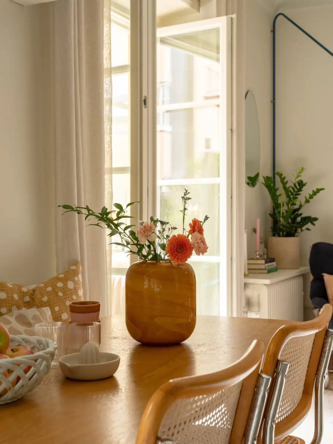 A Light Color Palette and a Charming Private Patio in a Stockholm Apartment 12 dining table detail