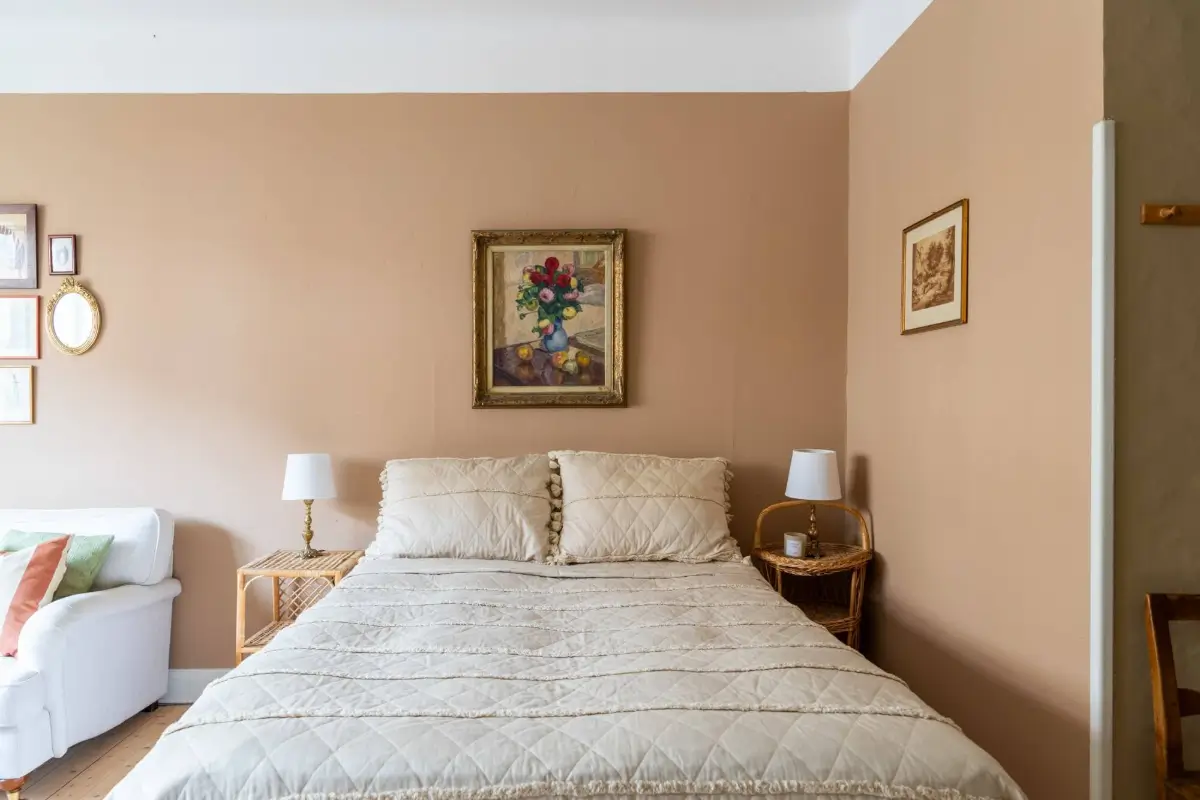 Warm Tones, Antiques, and Period Features in a Swedish Studio Apartment 6 earthy-colored walls studio apartment