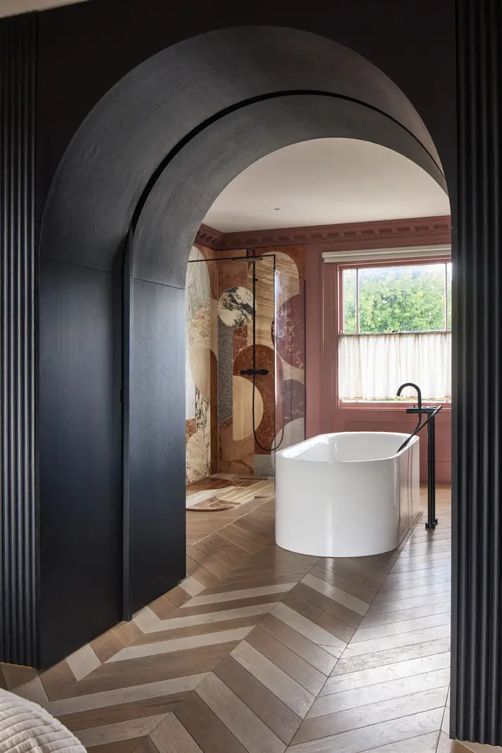 Victorian Grandeur Meets Modern Design in a Camden Square Townhouse 17 en-suite bathroom freestanding bath marble tiles chevron floor nordroom