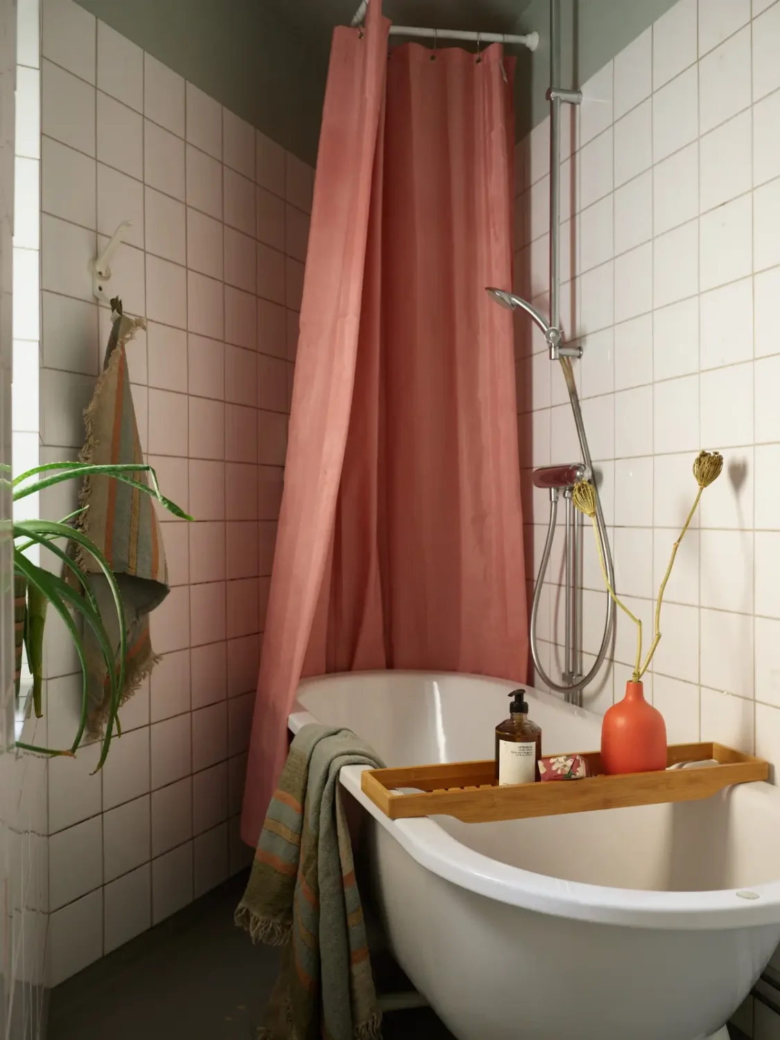 A Spacious Family Apartment with Original Details in Stockholm 28 freestanding bath white tiles green ceiling