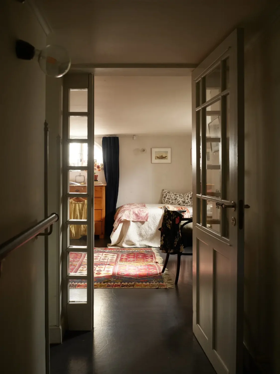 A Well-Preserved 1920s House with a Green Kitchen in Stockholm 30 glass door basement bedroom