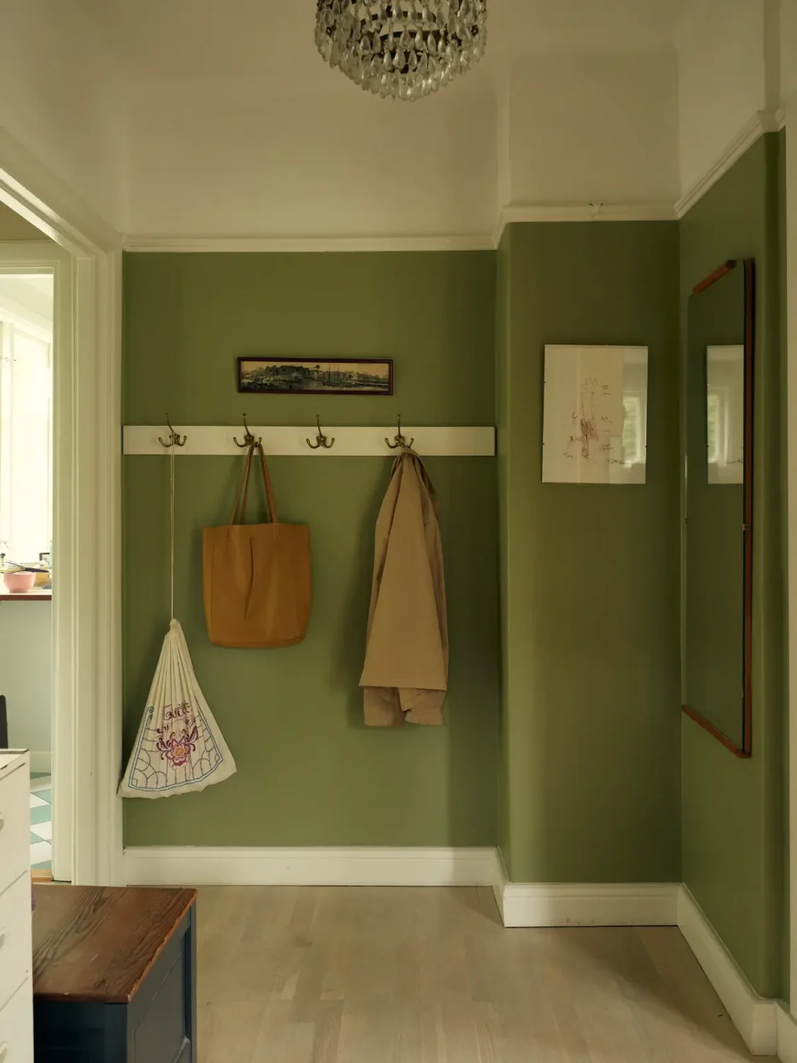 A Cheerful Color Palette in an Early 20th Century Villa in Stockholm 17 green hall