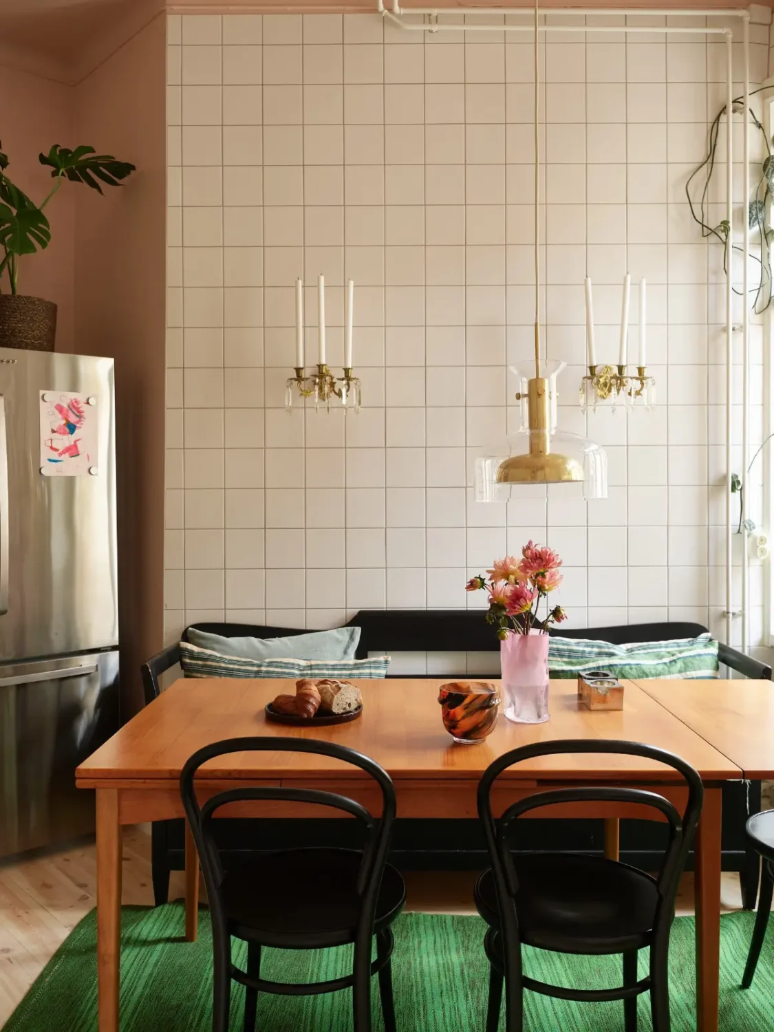 A Spacious Family Apartment with Original Details in Stockholm 19 kitchen dining space white tiles