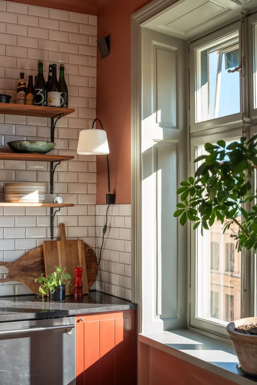 Historic Elegance and a French-Style Kitchen and Bathroom in a Stockholm Apartment 18 kitchen window terracotta-pink wall color nordroom