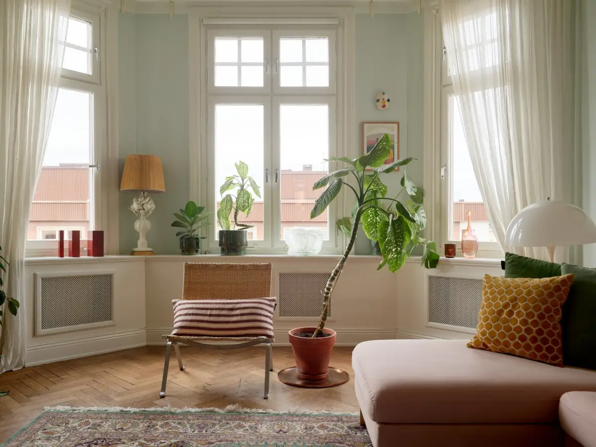 A Spacious Family Apartment with Original Details in Stockholm 4 large bay window