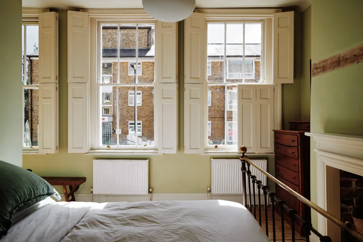 Restored Features in a Charming Georgian Apartment in London 12 large windows with shutters