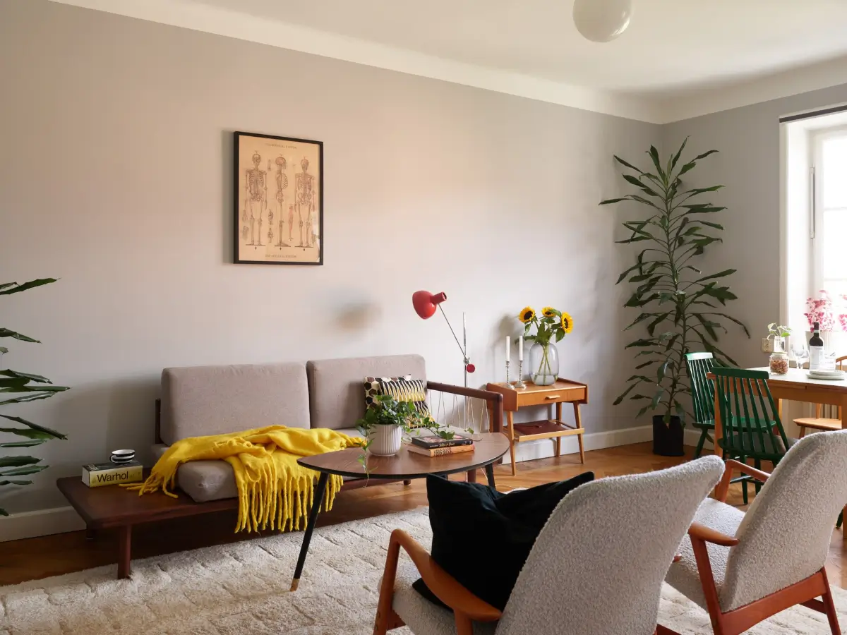 Midcentury Furniture & a Dark Blue Bedroom in a 1930s Apartment 1 living room light gray walls midcentury style