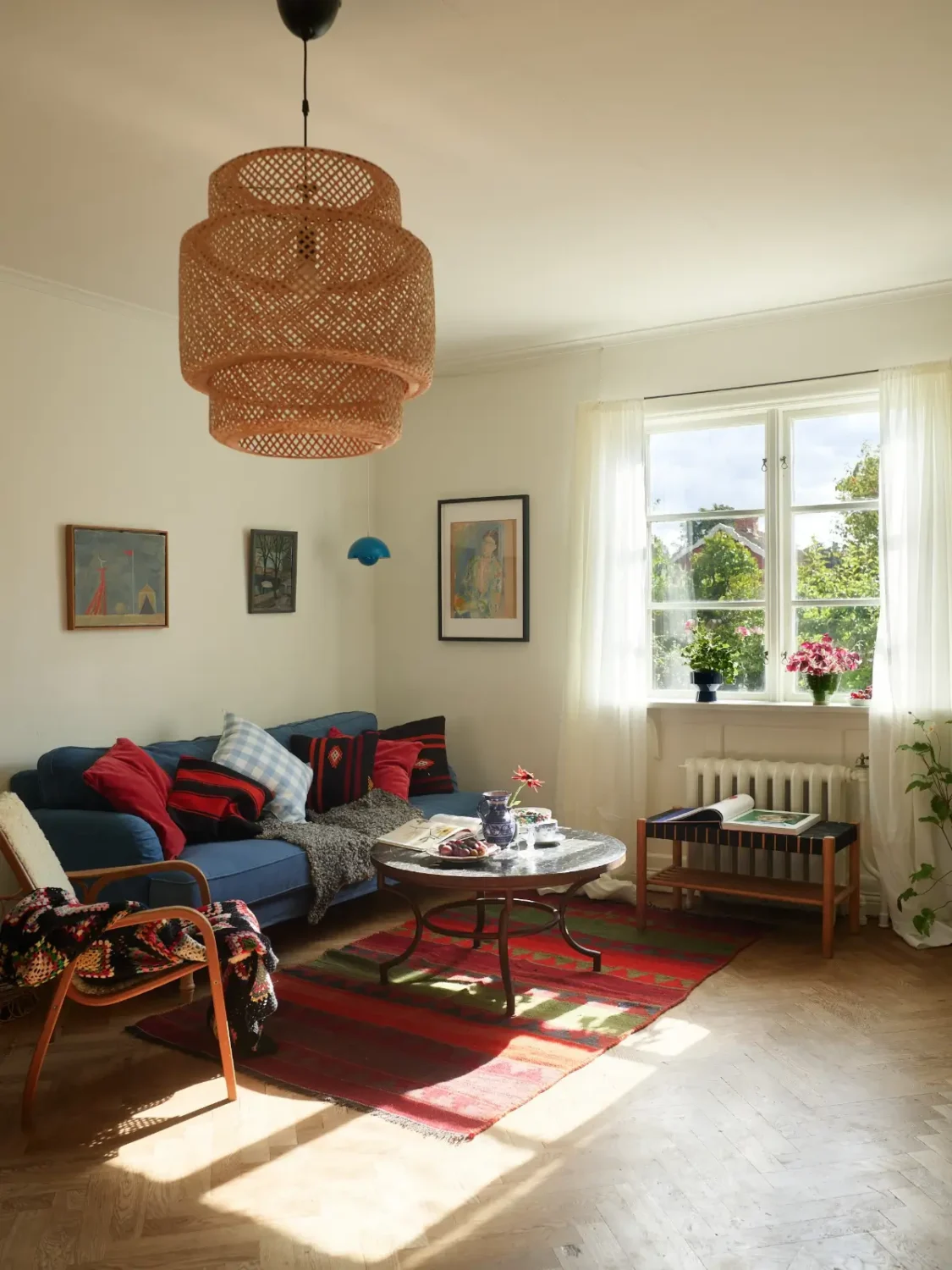 A Well-Preserved 1920s House with a Green Kitchen in Stockholm 14 living room parquet floor