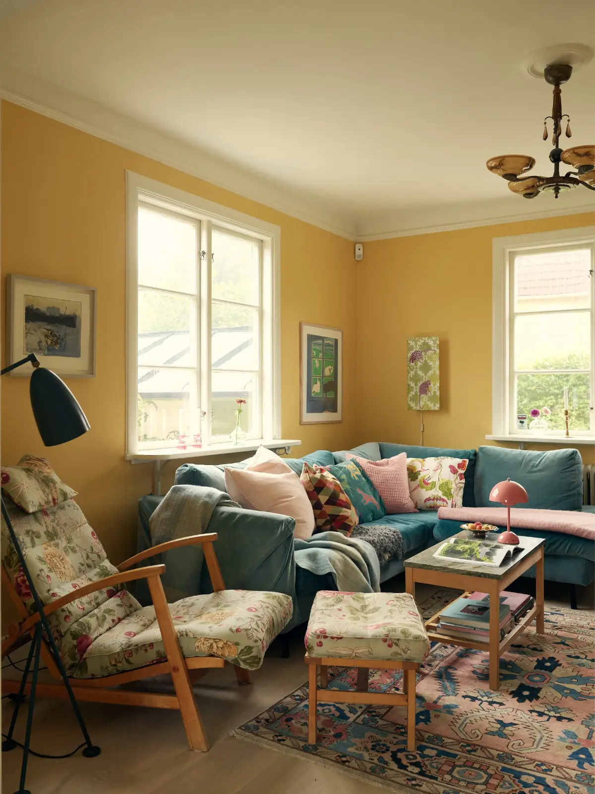 living room sunny yellow walls blue sofa nordroom