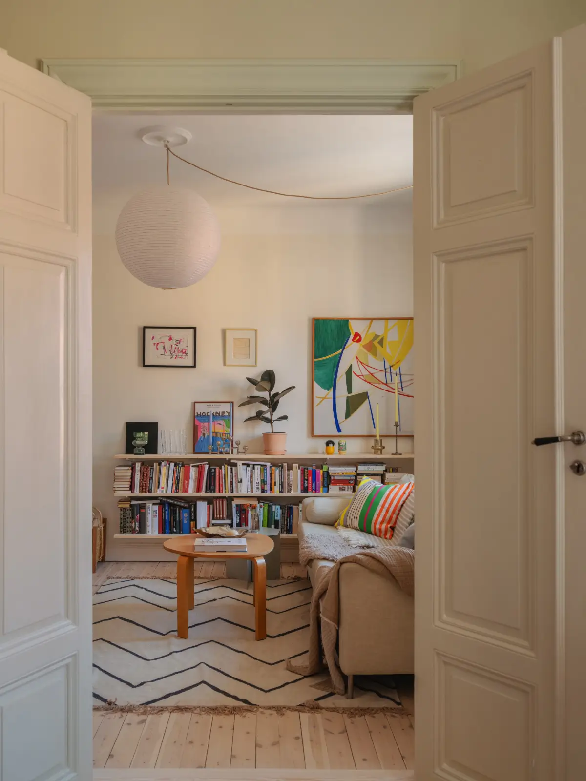 living room with bookshelves